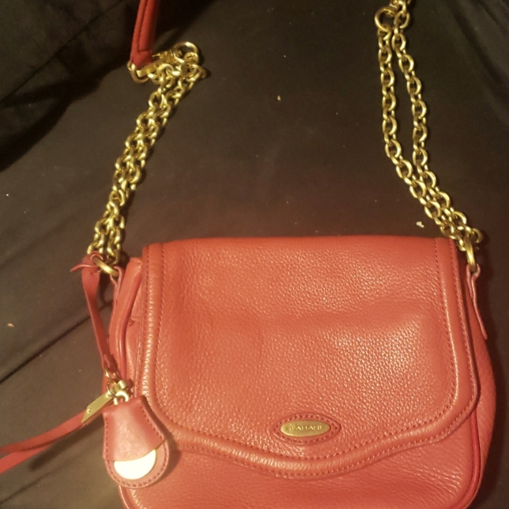Red leather Tahari bag.Gold hardware.
